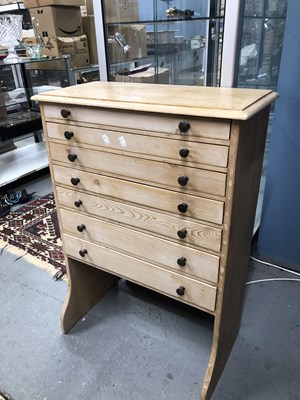 Lot 355 - A pine collectors cabinet of seven graded...