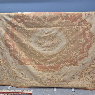 Lot 358 - An Aubusson style flat weave beige ground rug...