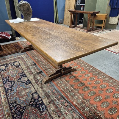 Lot 359 - An oak refectory table on cup and cover...