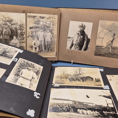 Lot 371 - Two albums of early 20th century Japanese...