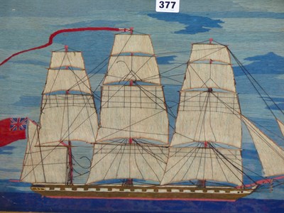 Lot 377 - A wool work picture of a British three masted...