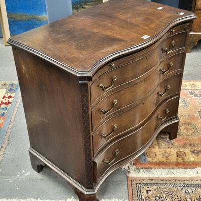 Lot 384 - A George III style mahogany serpentine chest...