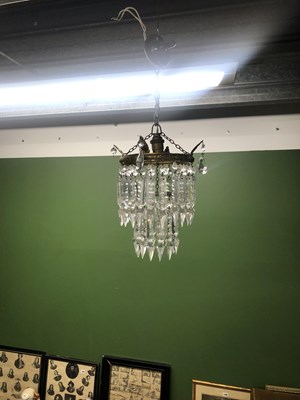 Lot 702 - Two antique chandeliers.