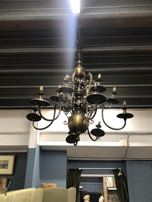Lot 715 - An impressive ten armed chandelier.
