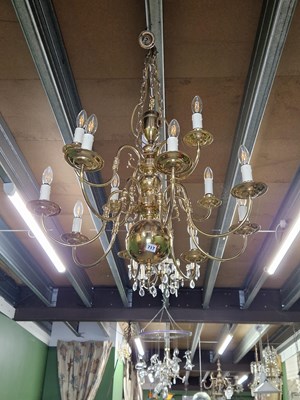 Lot 717 - A twelve armed Dutch chandelier.