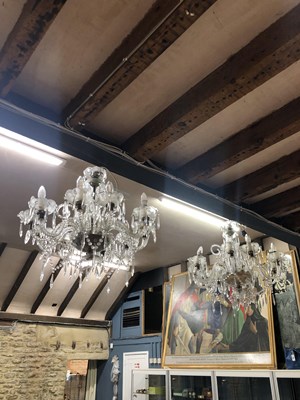 Lot 718 - A pair of ten armed Murano chandeliers