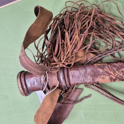 Lot 391 - An African single edged curved sword with a...