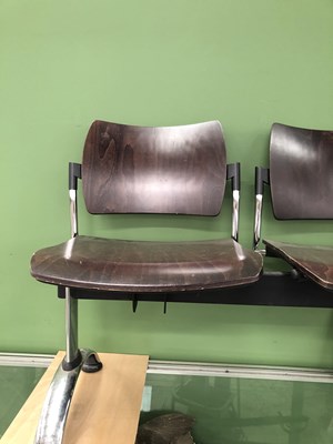 Lot 701 - A designer five seat wood and chrome bench