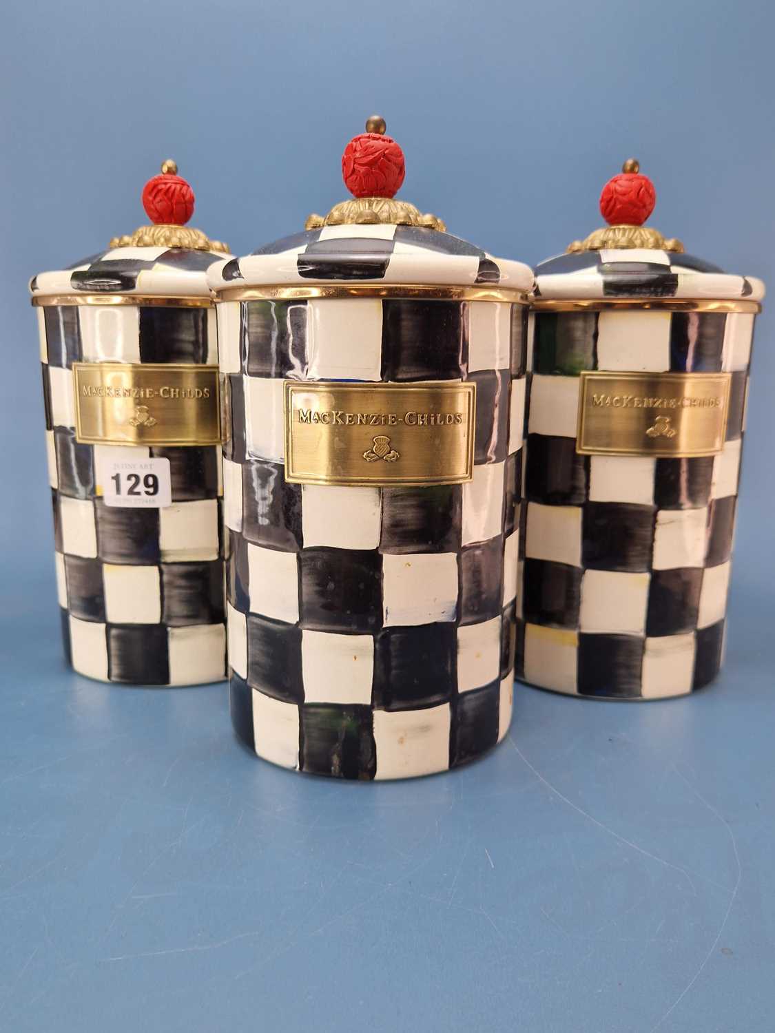 Lot 129 - Mackenzie-Childs. Three courtly check enamel...