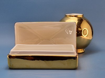 Lot 140 - Aerin. A Marion gold gilded round vase and a...