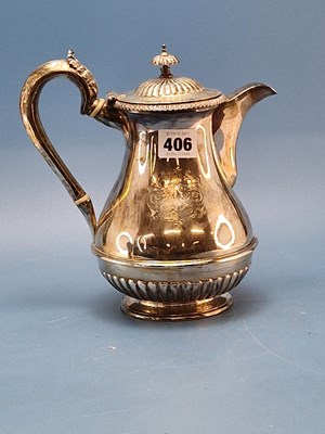 Lot 406 - A George III silver coffee pot by Garrards,...