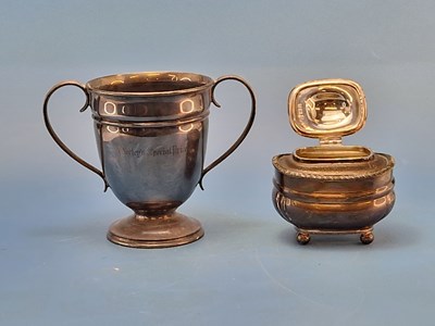 Lot 407 - A silver two handled tophy cup by Henry Atkin,...