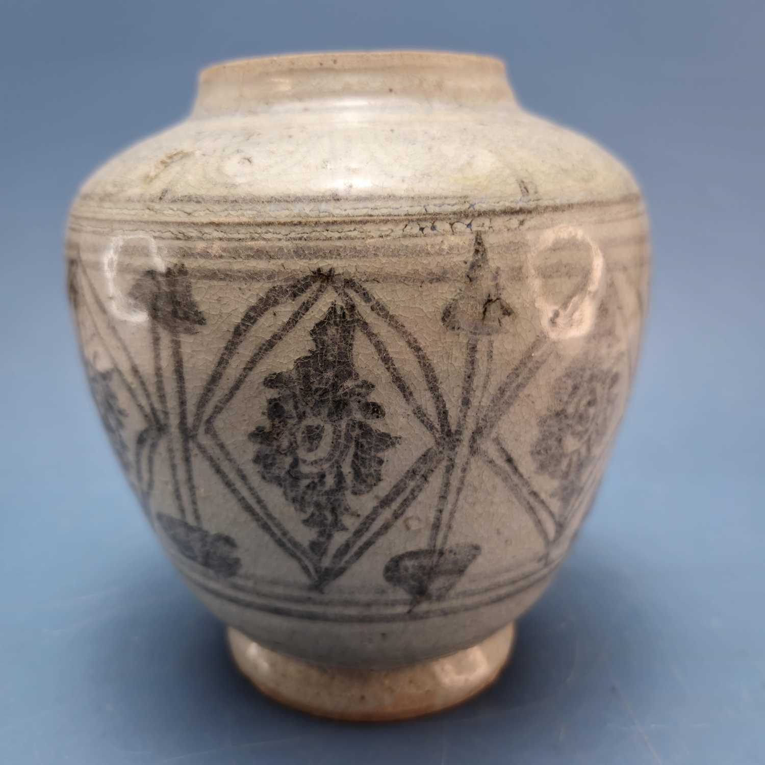 Lot 412 - A 15th century Sawankhalok grey pottery jar...