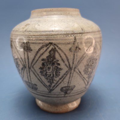Lot 412 - A 15th century Sawankhalok grey pottery jar...