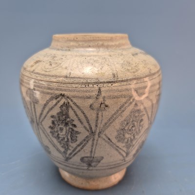 Lot 412 - A 15th century Sawankhalok grey pottery jar...