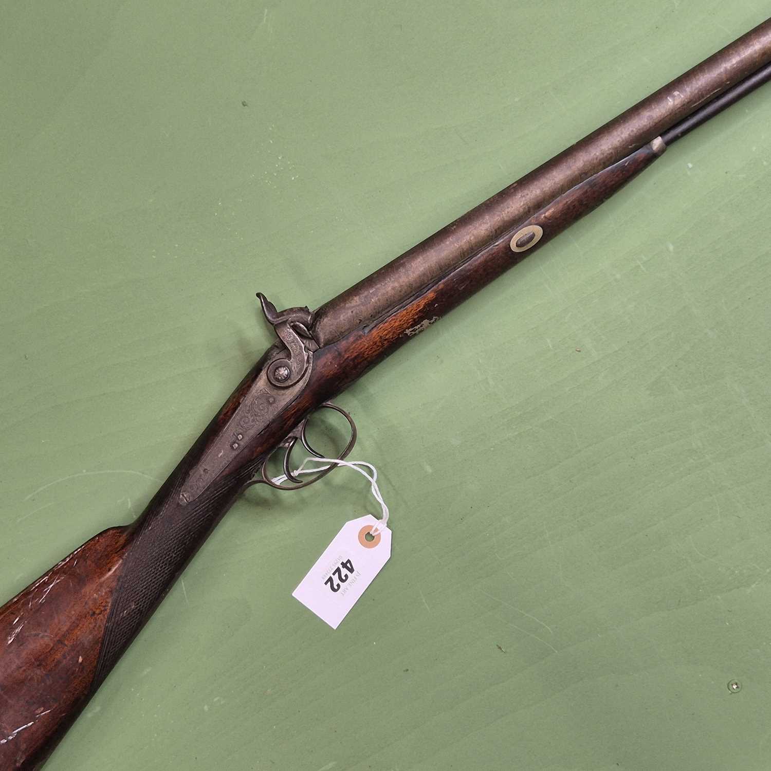 Lot 422 - A percussion cap double barrel 12-bore muzzle...