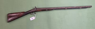 Lot 422 - A percussion cap double barrel 12-bore muzzle...