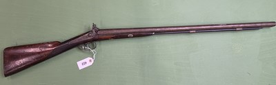Lot 422 - A percussion cap double barrel 12-bore muzzle...