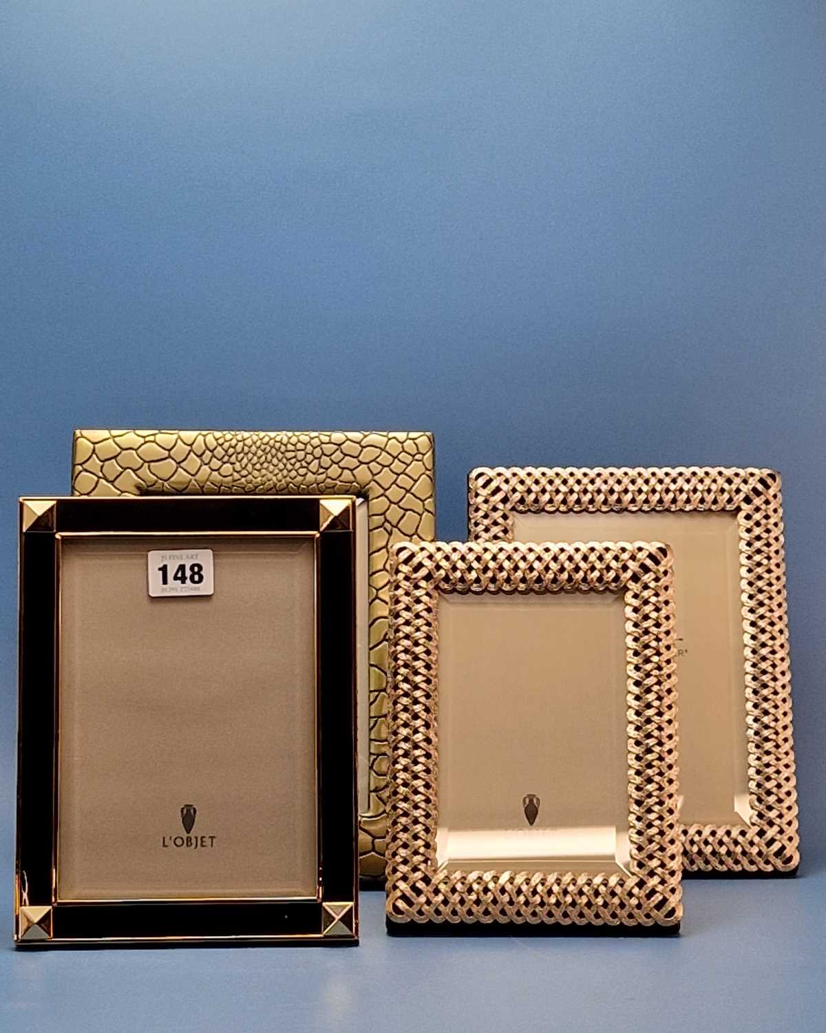 Lot 148 - L'Objet. Four frames. An embossed gold frame,...