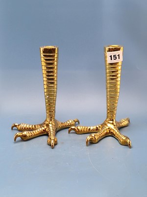 Lot 151 - Jonathan Adler. A pair of brass talon candle...