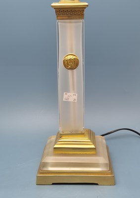 Lot 155 - Versace. A frosted glass column and gold tone...