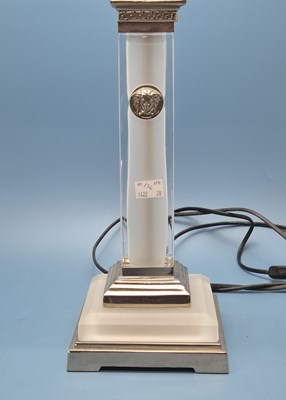 Lot 156 - Versace. A frosted glass column and silver...