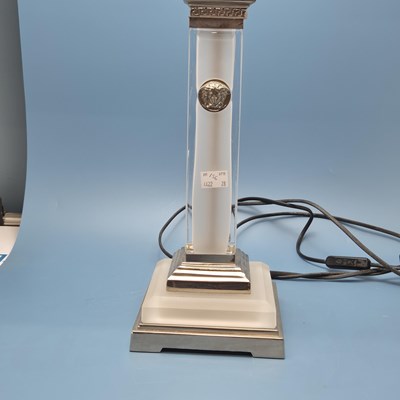 Lot 156 - Versace. A frosted glass column and silver...