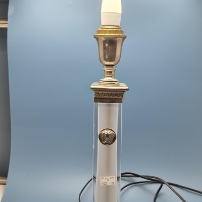 Lot 156 - Versace. A frosted glass column and silver...