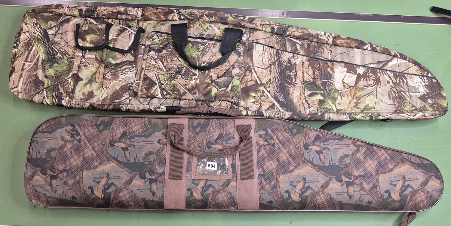Lot 594 - Two padded zip up gun cases.