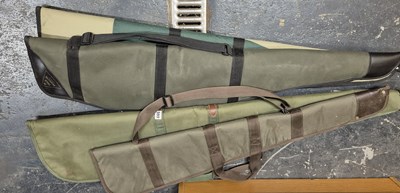 Lot 599 - Four Good quality padded gun cases with full...