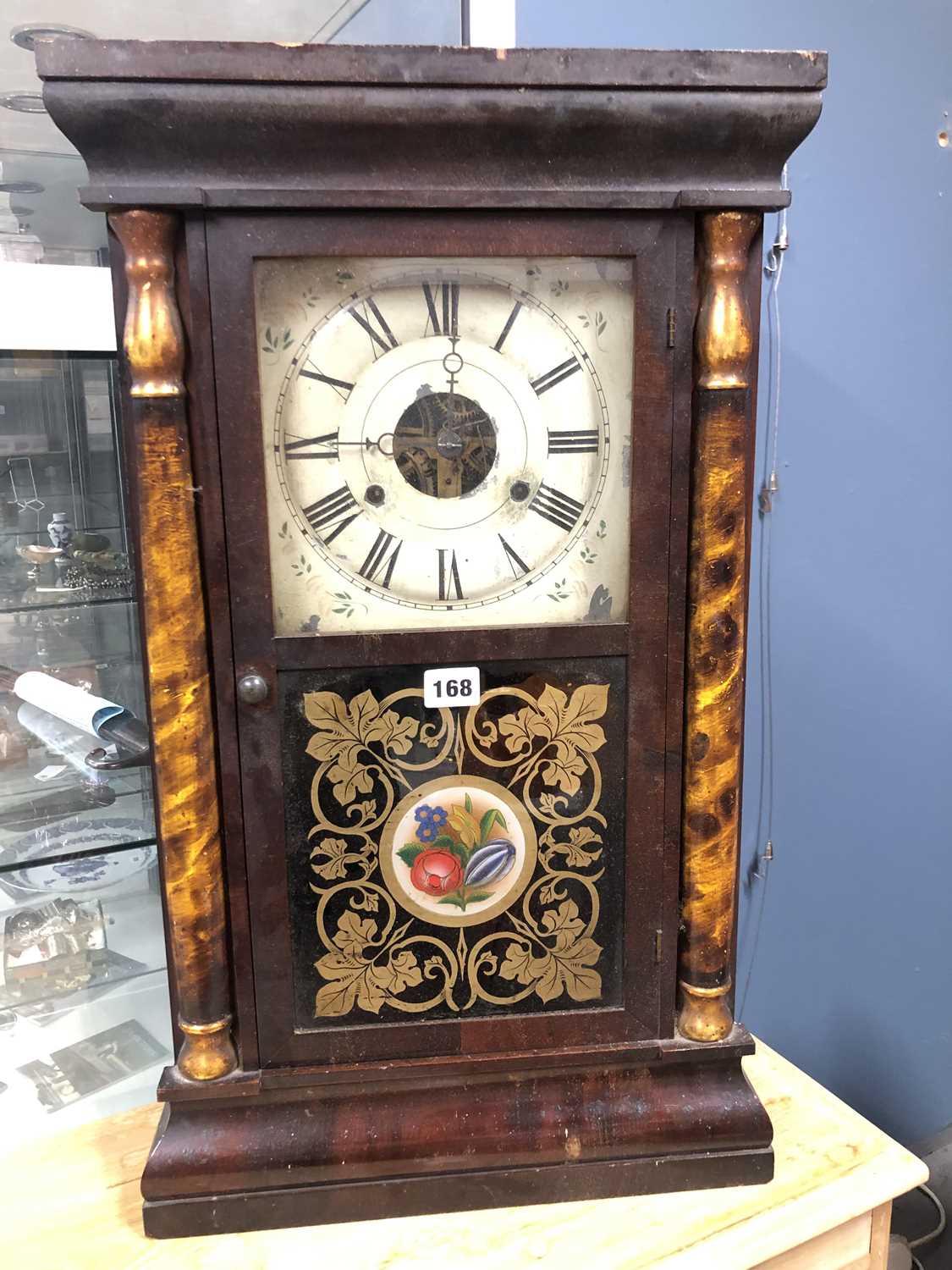 Lot 168 - A Seth Thomas wall clock striking on a coiled...
