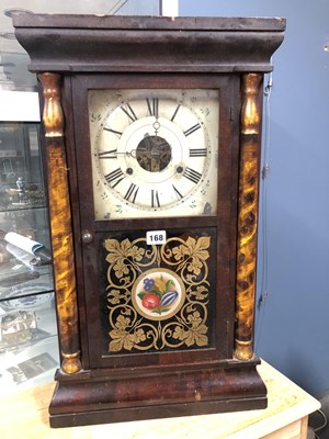 Lot 168 - A Seth Thomas wall clock striking on a coiled...
