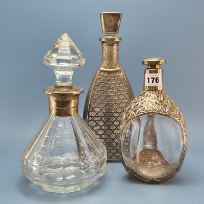 Lot 176 - A Sterling silver mounted glass decanter and...