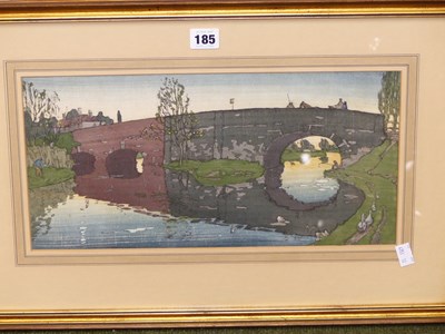 Lot 185 - Manner of Sir Frank Brangwyn, a bridge scene,...