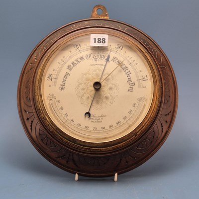 Lot 188 - A mahogany framed aneroid barometer and...