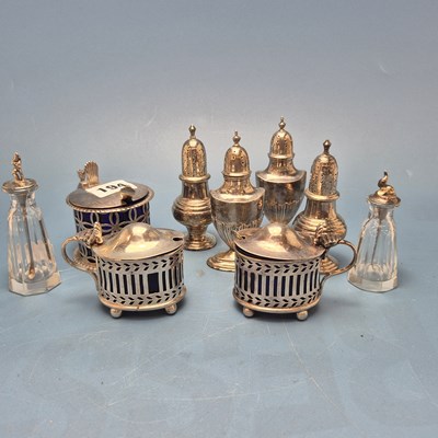 Lot 194 - Two pairs of silver peppers, a pair of silver...