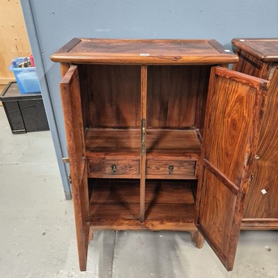 Lot 108 - A pair of Chinese hardwood cabinets, the sides...