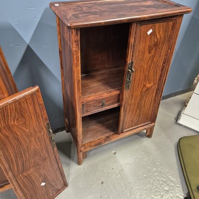 Lot 108 - A pair of Chinese hardwood cabinets, the sides...
