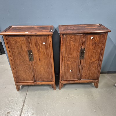Lot 108 - A pair of Chinese hardwood cabinets, the sides...