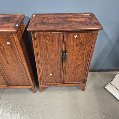 Lot 108 - A pair of Chinese hardwood cabinets, the sides...