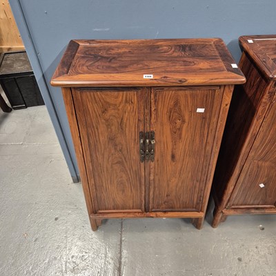 Lot 108 - A pair of Chinese hardwood cabinets, the sides...