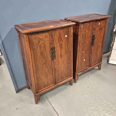 Lot 108 - A pair of Chinese hardwood cabinets, the sides...