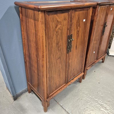 Lot 108 - A pair of Chinese hardwood cabinets, the sides...