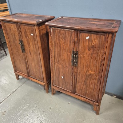 Lot 108 - A pair of Chinese hardwood cabinets, the sides...