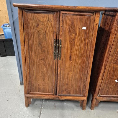 Lot 108 - A pair of Chinese hardwood cabinets, the sides...