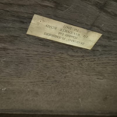 Lot 110 - An Arts and Crafts oak table supported on four...