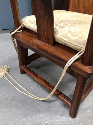 Lot 111 - A pair of Chinese hardwood children's chairs,...