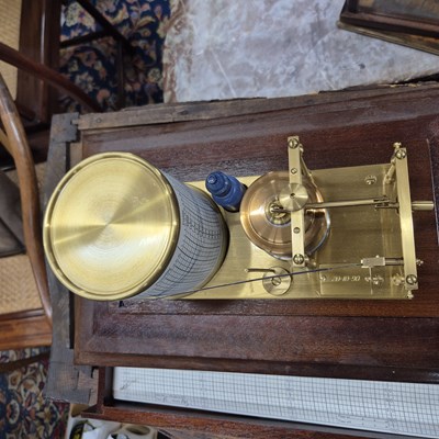 Lot 196 - A barograph in a bevelled glazed mahogany case...