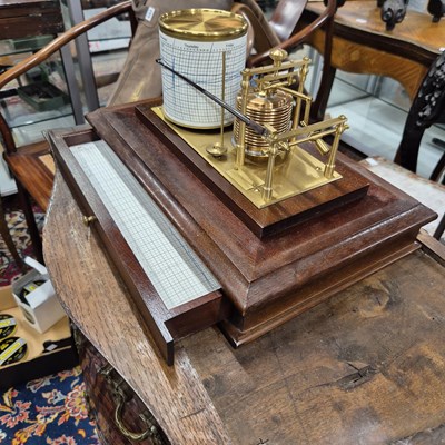 Lot 196 - A barograph in a bevelled glazed mahogany case...