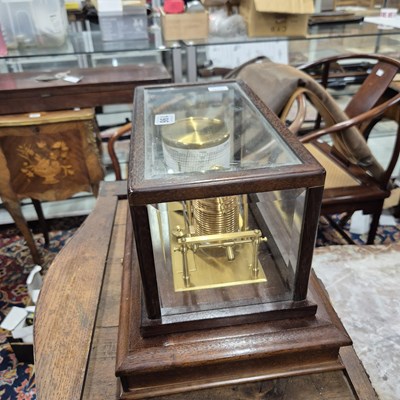 Lot 196 - A barograph in a bevelled glazed mahogany case...